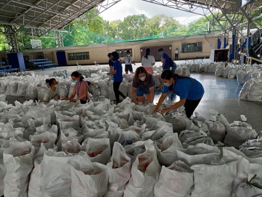 2022_10_1_Karding Relief Ops_Organizing relief packs for deployment