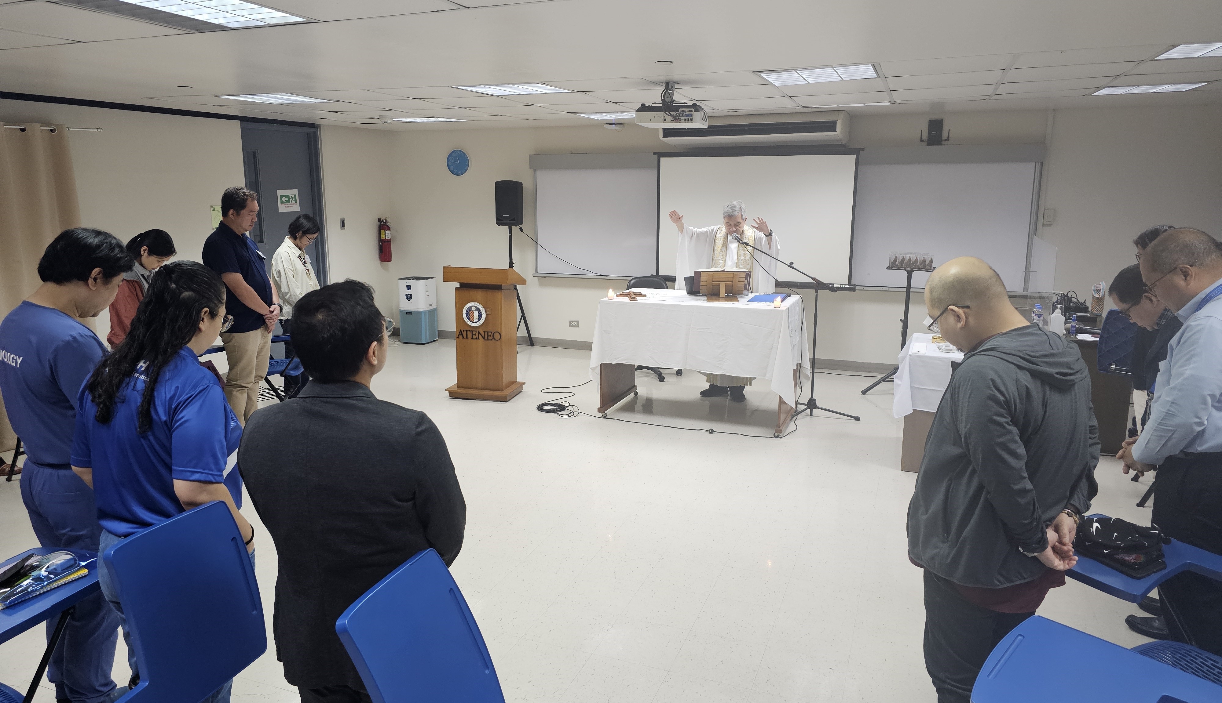 Fr Bobby Yap celebrating the Holy Eucharist in the ASMPH FPF
