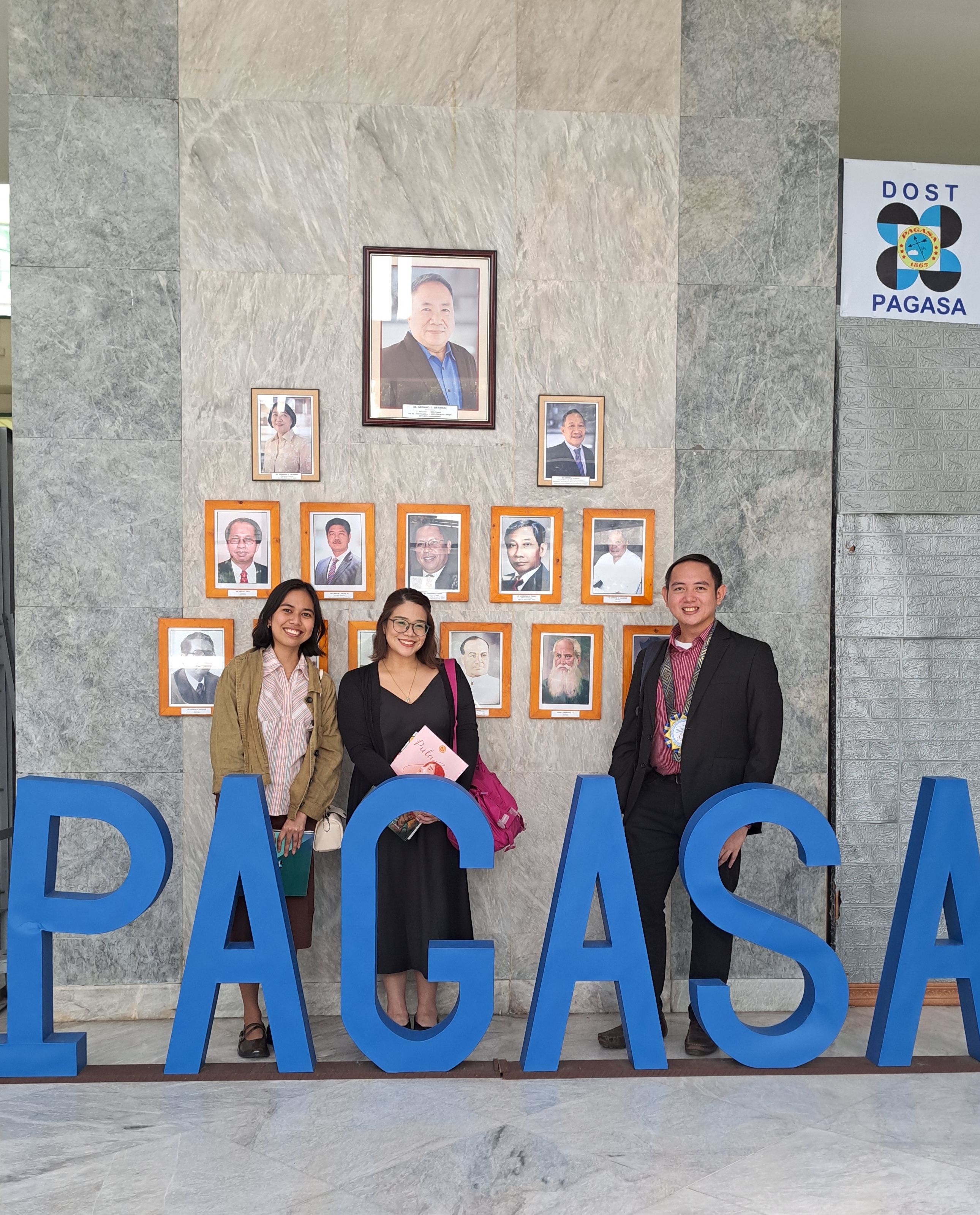 Ms Rizzie Rapada, AUN-EEC Secretariat Member, Ms Chris Lacdao-Umali, AUN-EEC Secretariat Head, and Dr Emmanuel Delocado, AUN-EEC Executive Director posed for a photo opportunity at the PAGASA Science Garden lobby