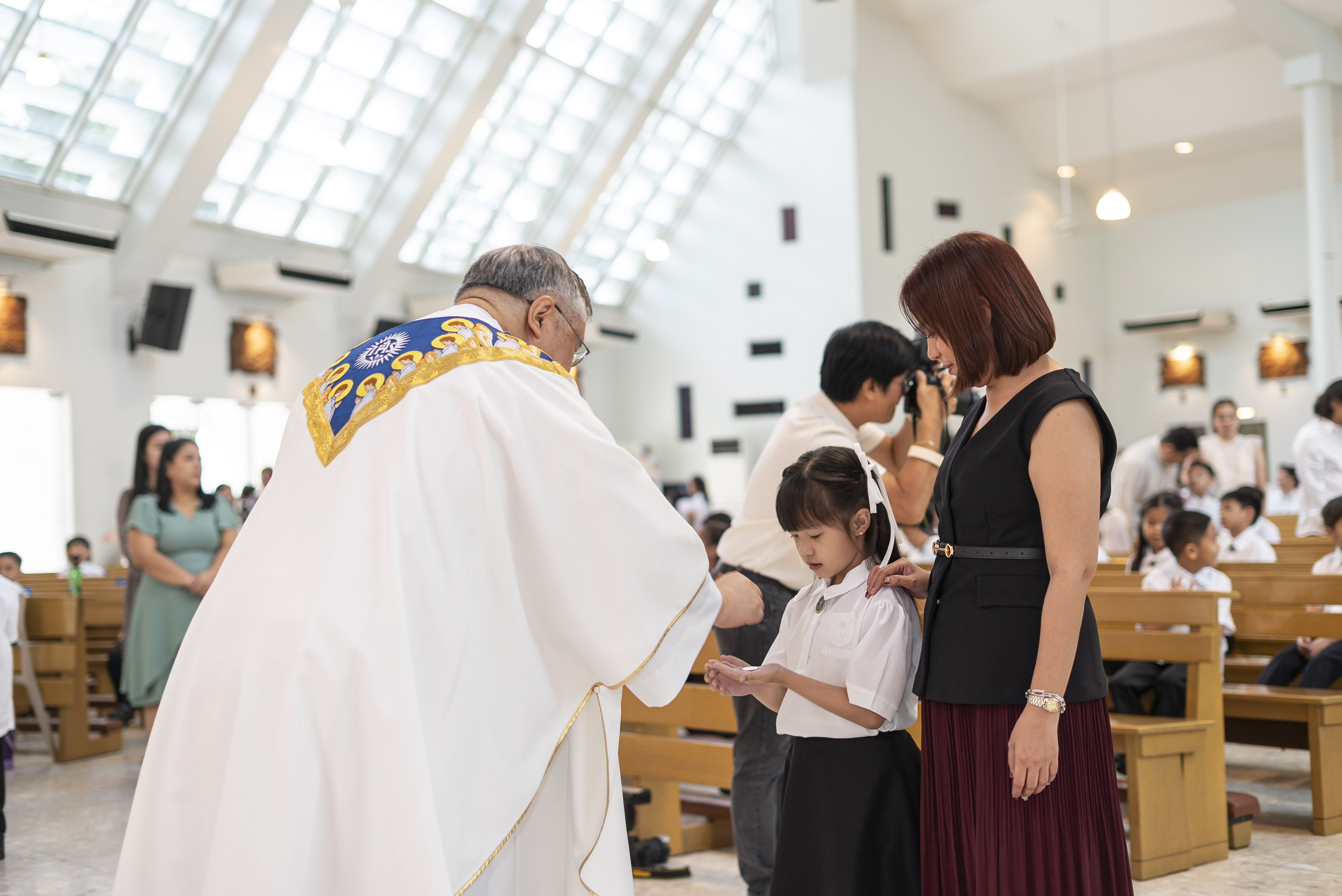 Female Ateneans receives her FHC