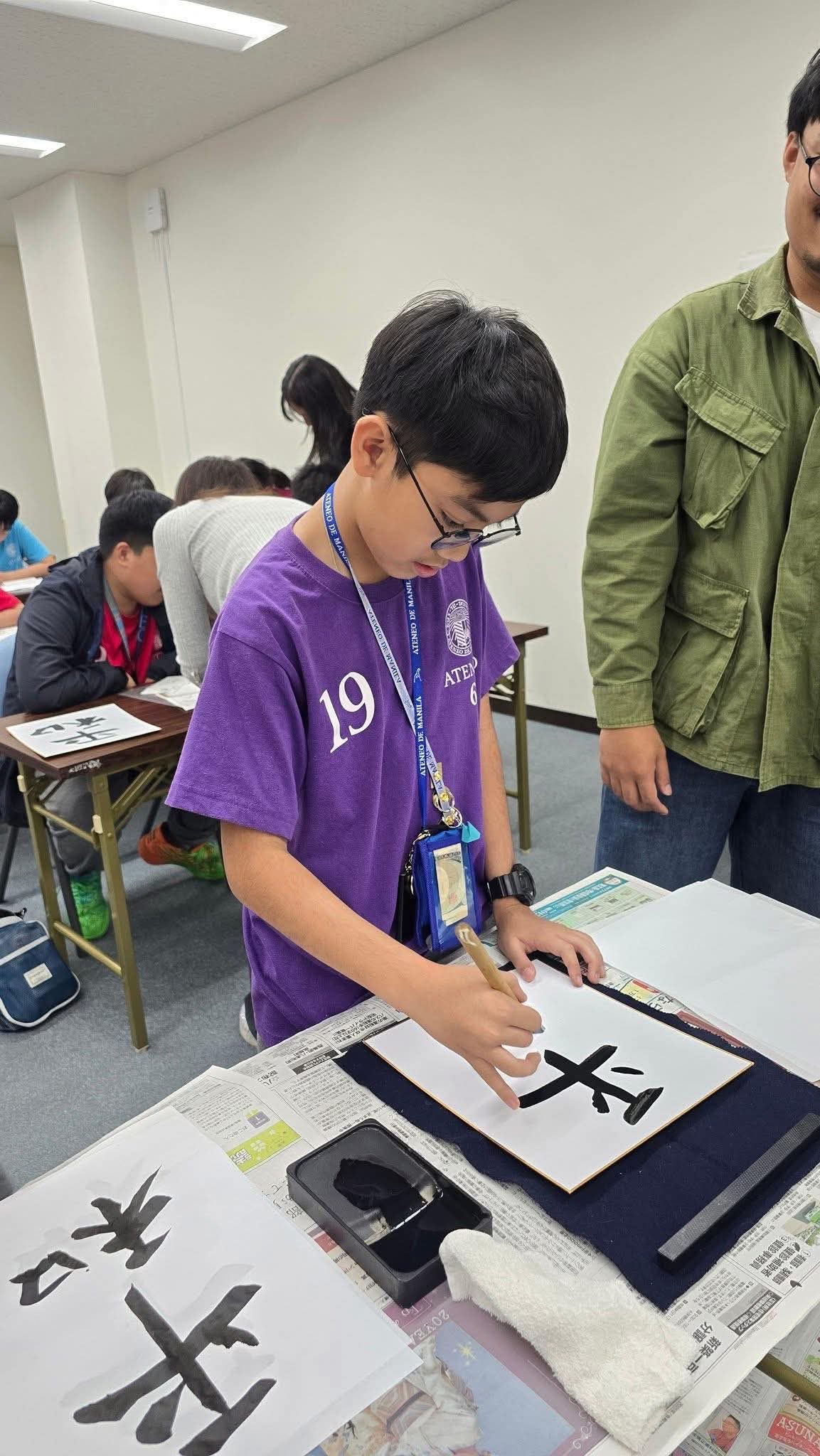 Marcus Molino learns calligraphy