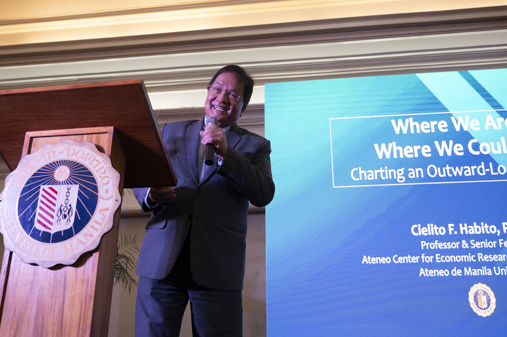 Dr Cielito F Habito takes the podium for his talk entitled “Where We Are, Where We Could Be: Charting an Outward-Looking Path.”