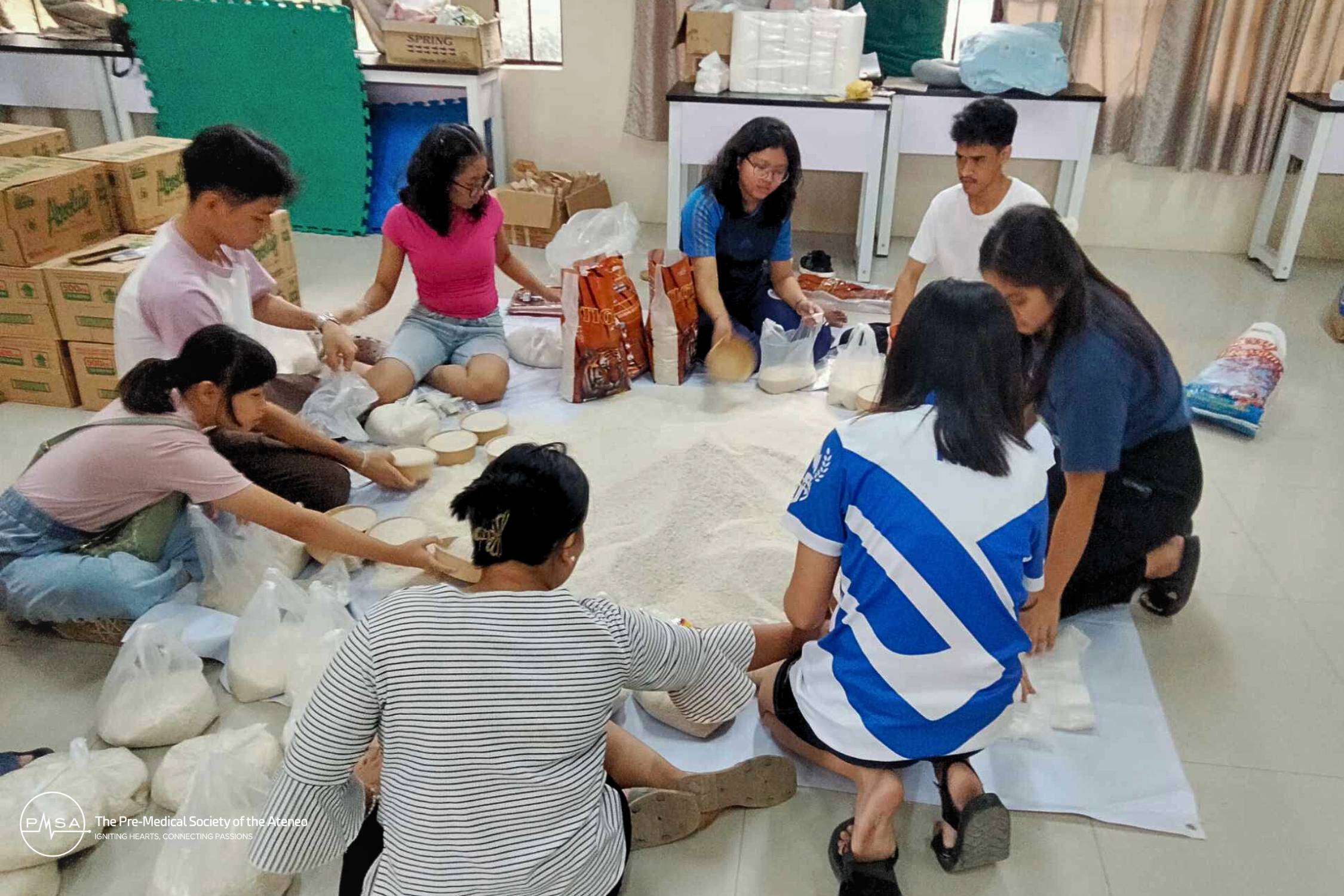 Photo 1. 	In-kind donations repacked in AdNU for distribution to community members