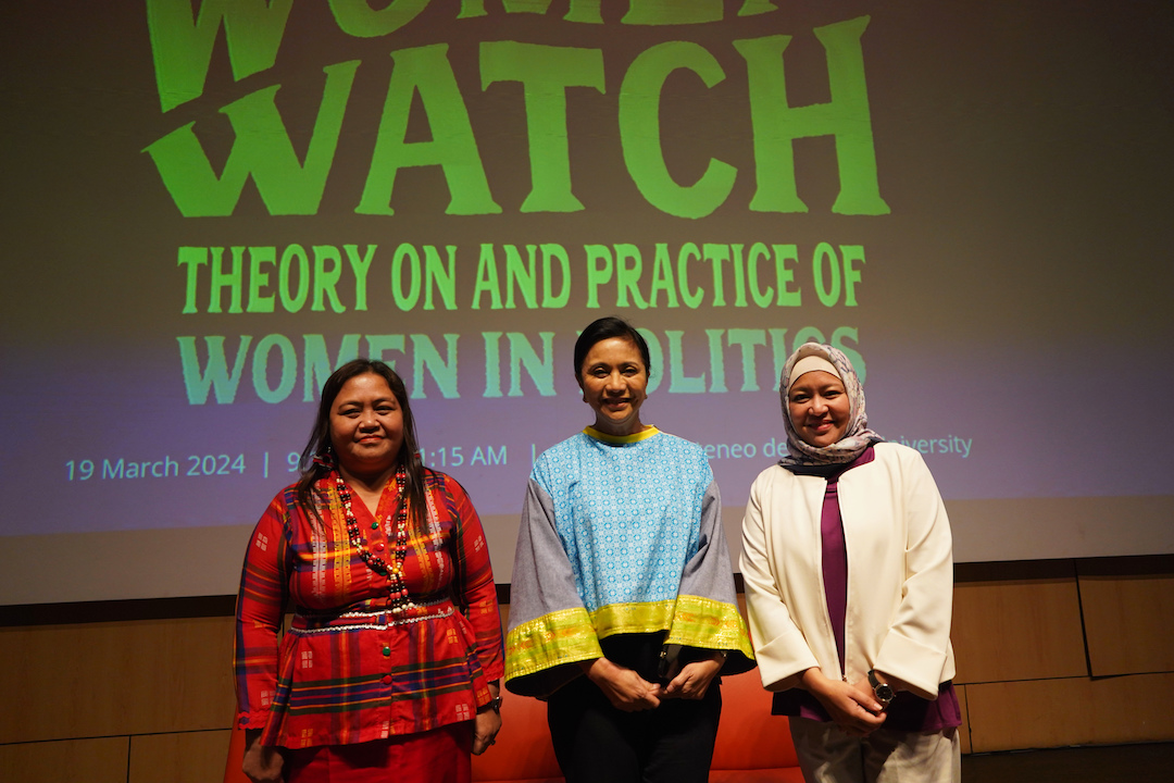 MP Mendoza, Atty Robredo, and Mayor Hataman in front of the words Women Watch: Theory on and Practice of Women in Politics