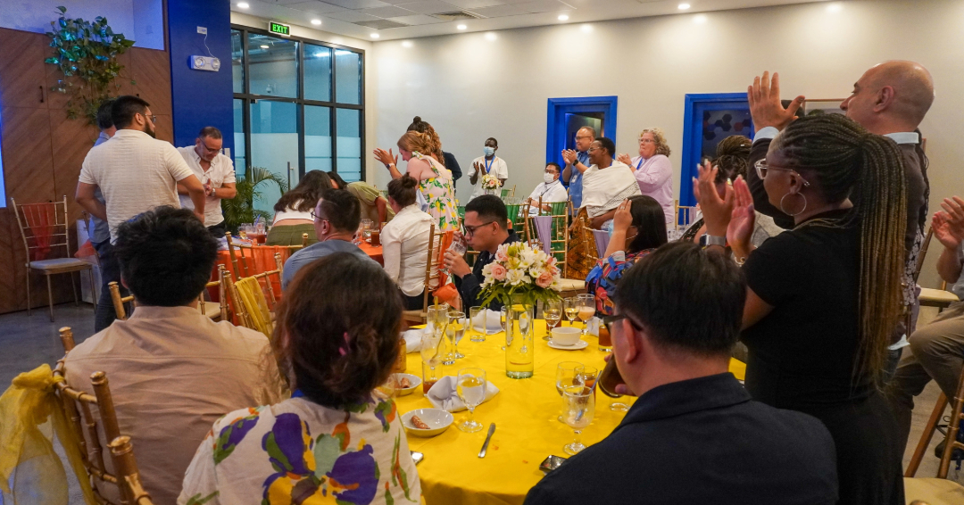 Participants enjoying getting together at the welcome dinner