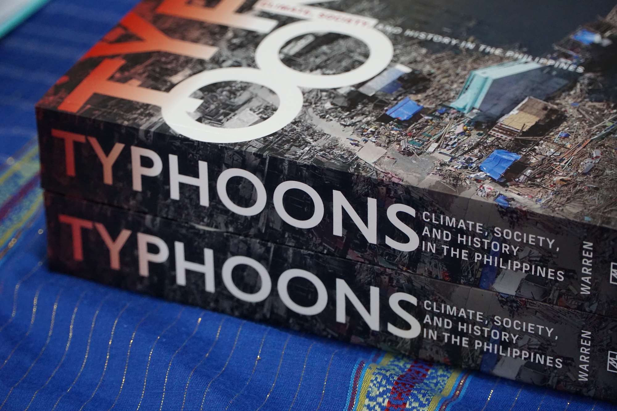 Copies of the book “Typhoons” by James Francis Warren