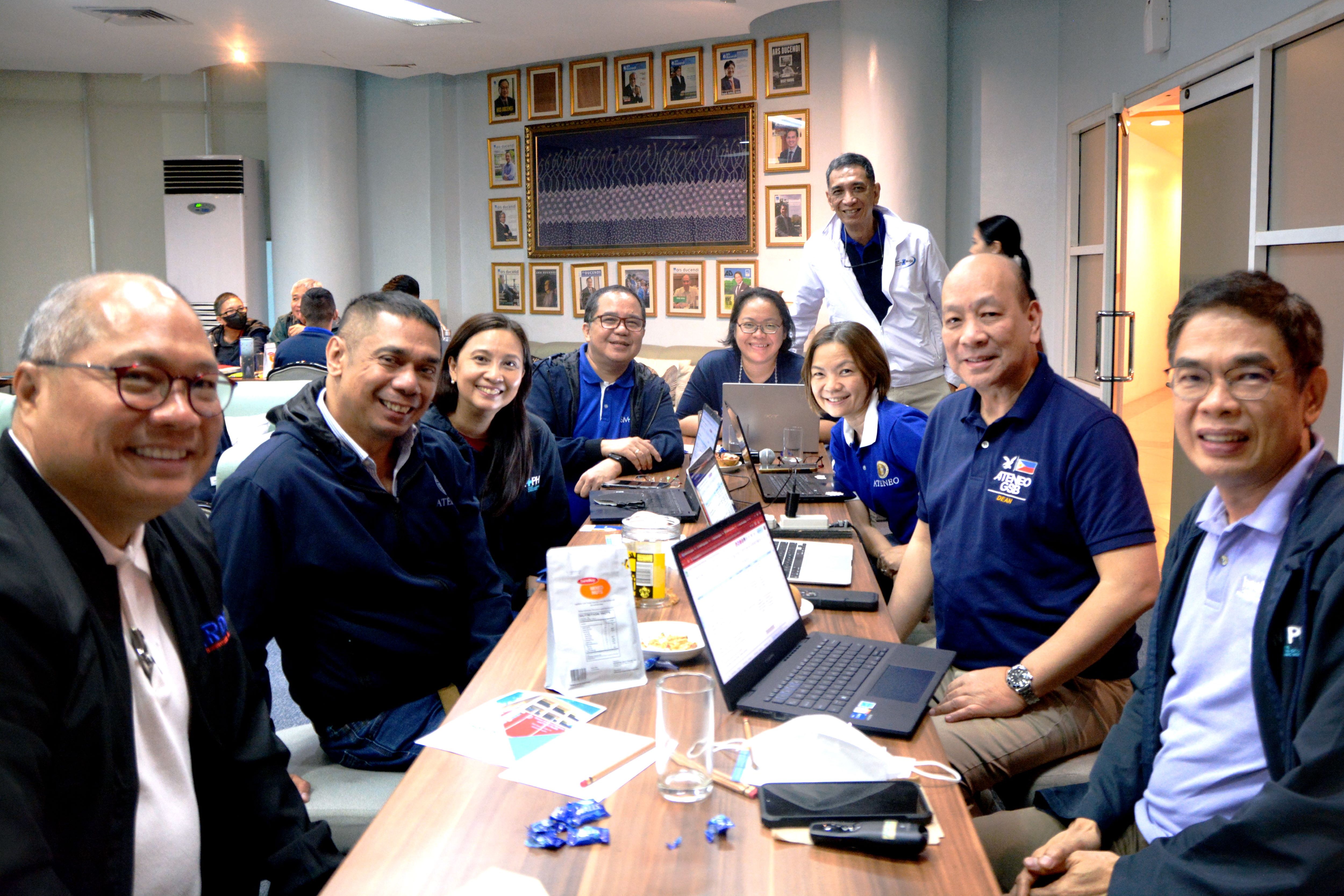 Dean Dodie Alfonso, Assoc Dean Dr Ray Baquiran and the Dean's Council (ASMPH) with Dean Jowett Magsaysay and Assoc Dean Luisito Montalbo (AGSB)