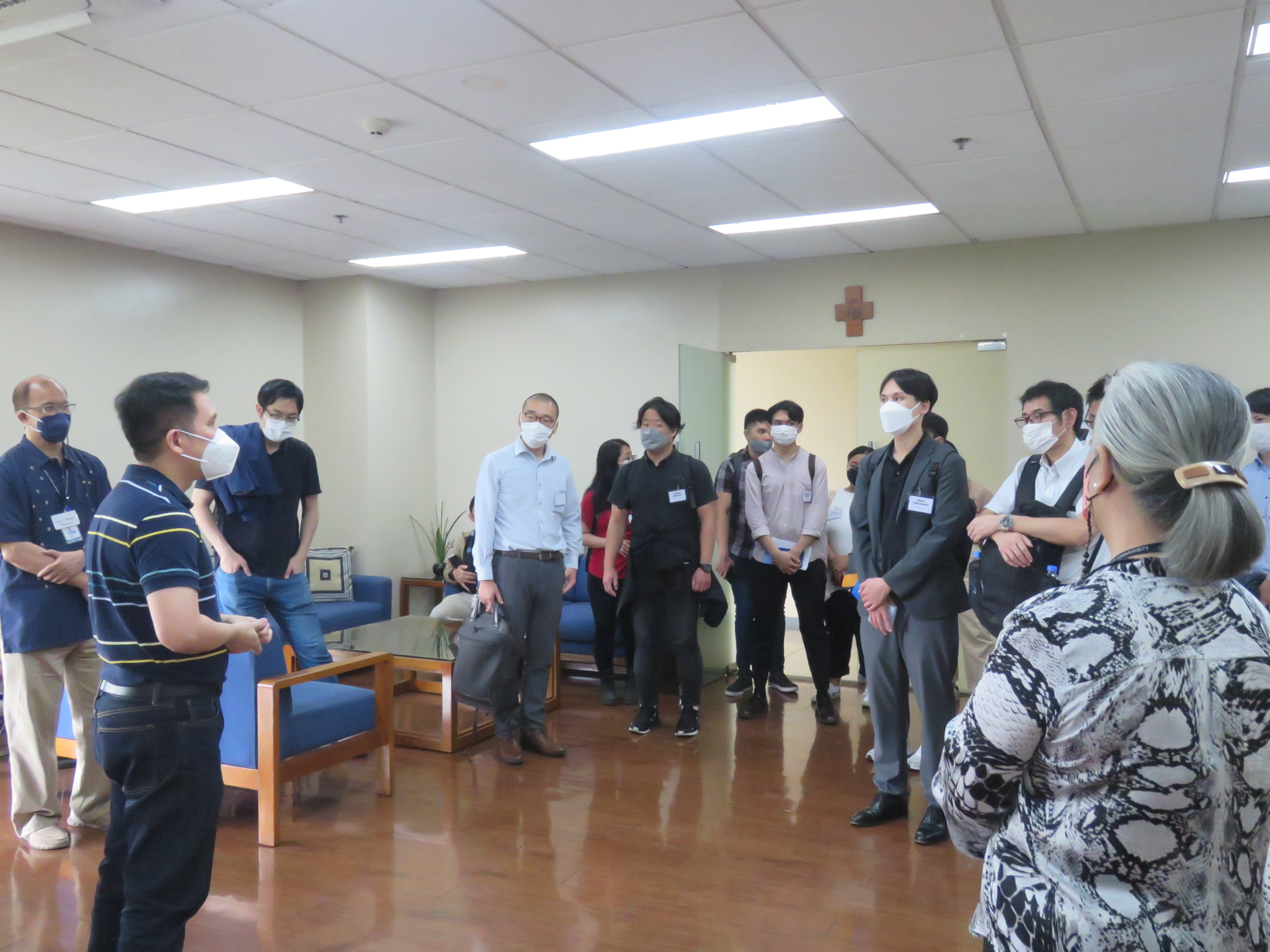 Dean Guerrero receiving Japanese guests in his office