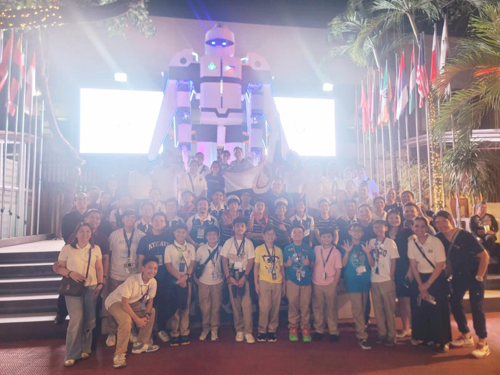 "Family photo" of Ateneo de Manila's GS and JHS representatives at the 14th First LEGO League Philippines competition in DYCI.  AGS won the "Best Rookie Team" award while AJHS won the "Most Improved Team" award.  