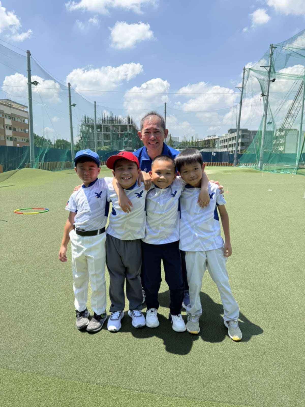 Coach Jong Castañeda with Nataniel Ilao, Cody Mercado, Datu Villamor, and Rupert Cariño