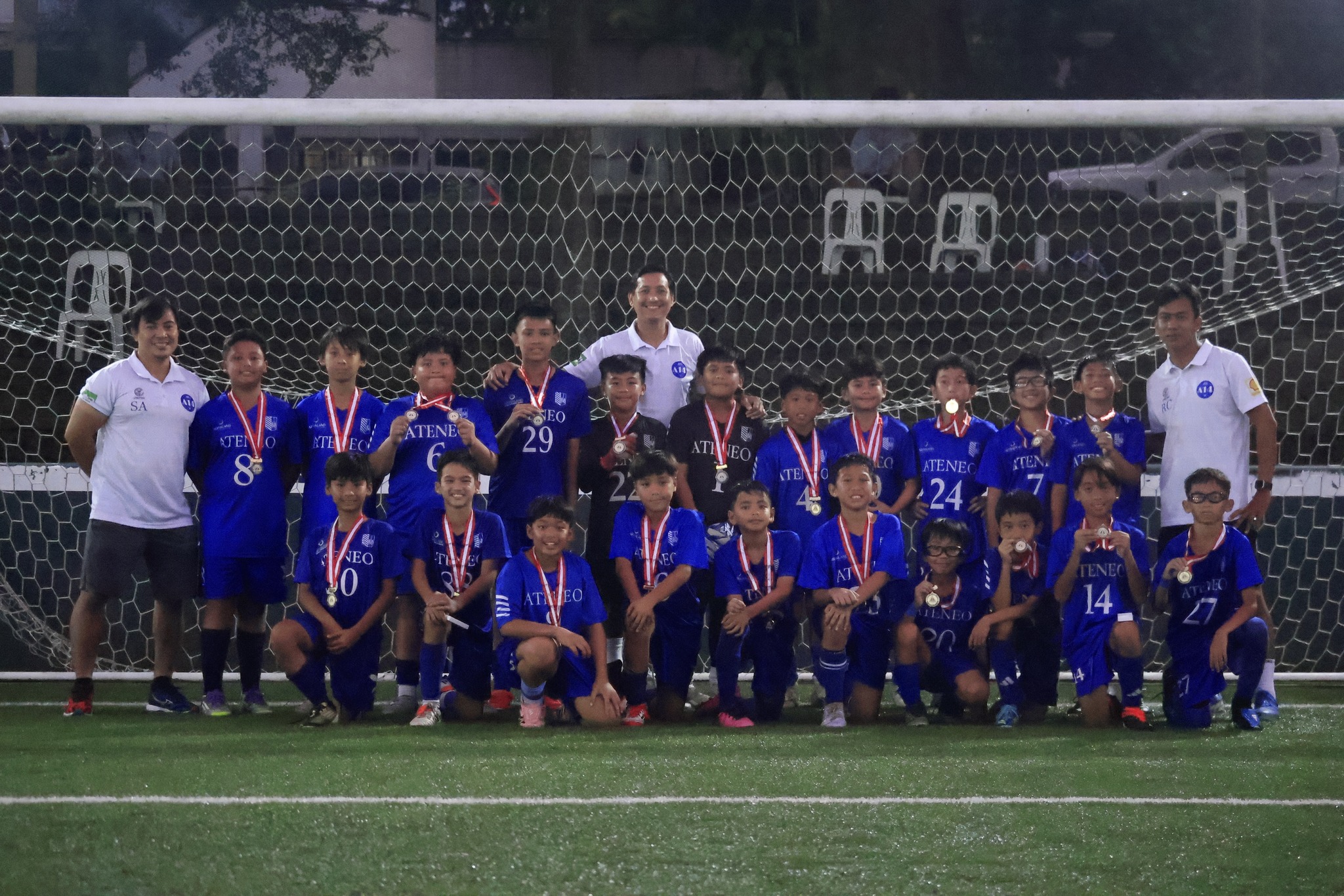 Front row from left: Boquiron, Sedenio, Cuyugan, Sumpaico, Bonto, Osite, Villanueva, Azores, Unson; top row from left: Coach Sean Alli, Lao, Mendoza, Tagarda, Lee, Castañeda, Coach Jr Judal, Tale, Castro, Pineda, De Villa, Chuidian, Landicho, Coach Rafael Cruz  