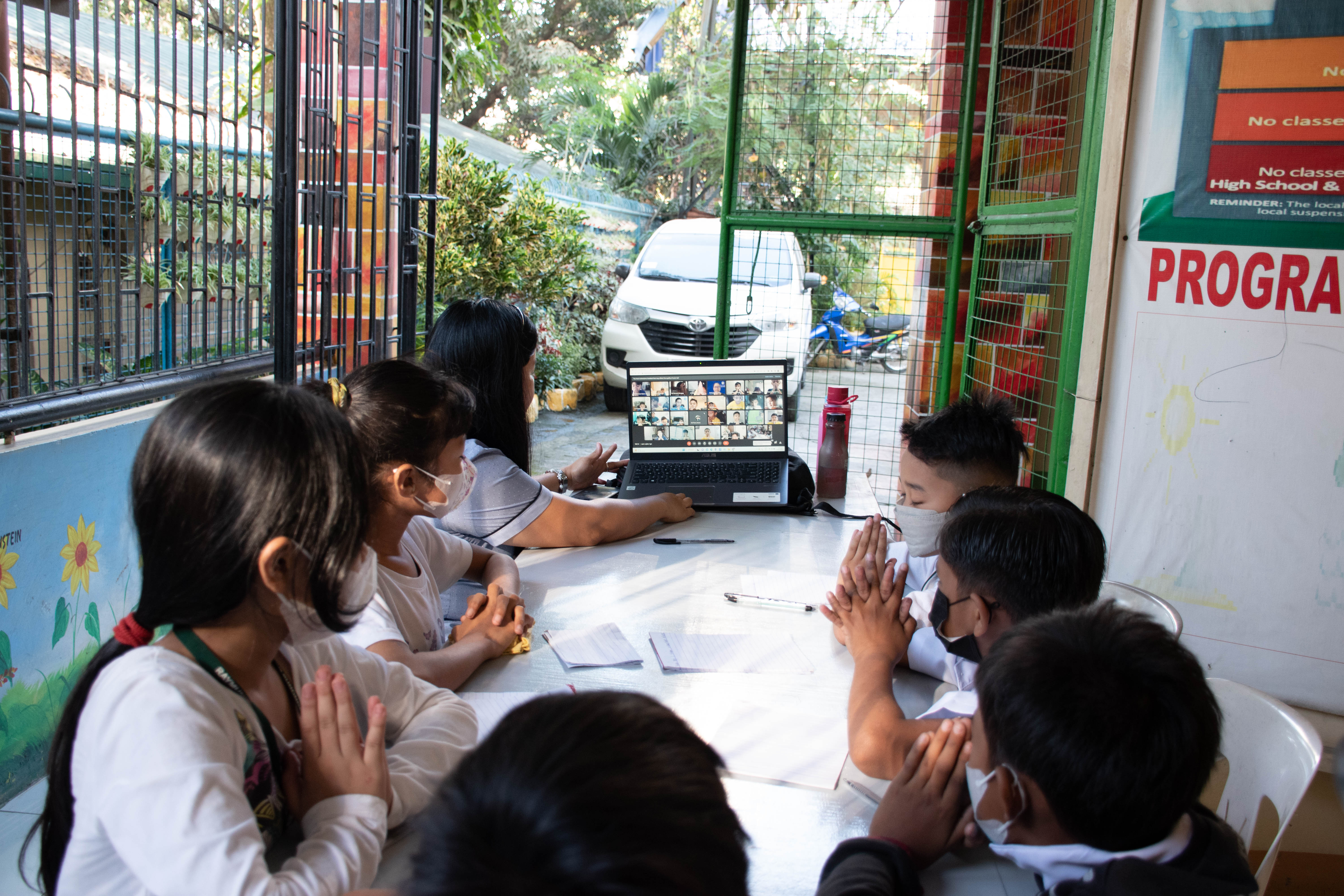 Students from Payatas B Annex Elementary interacting with our boys 