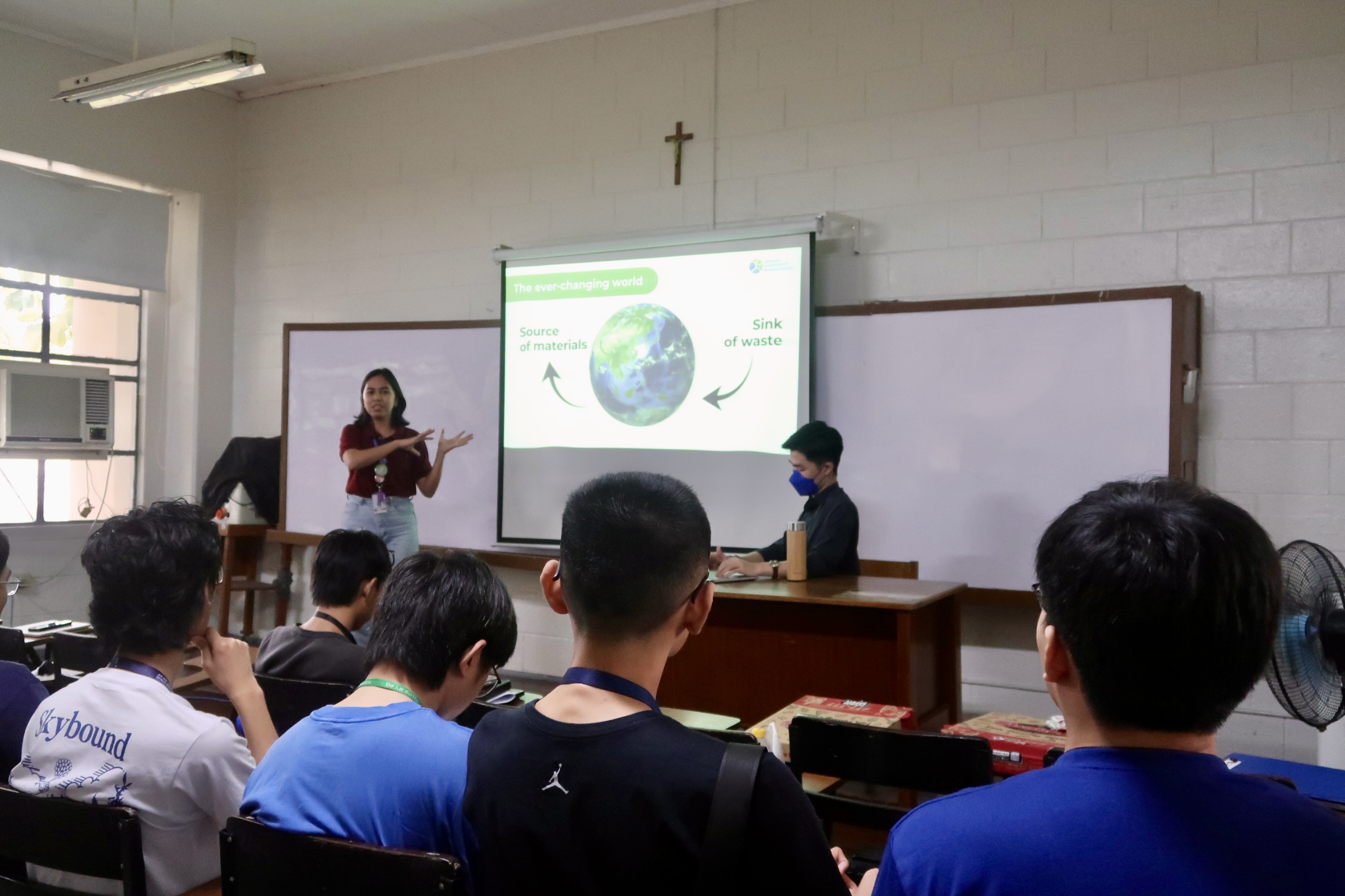 Ms. Rizzie Rapada, AIS Program Officer for SDGs,  opens the lecture with an introduction to sustainability