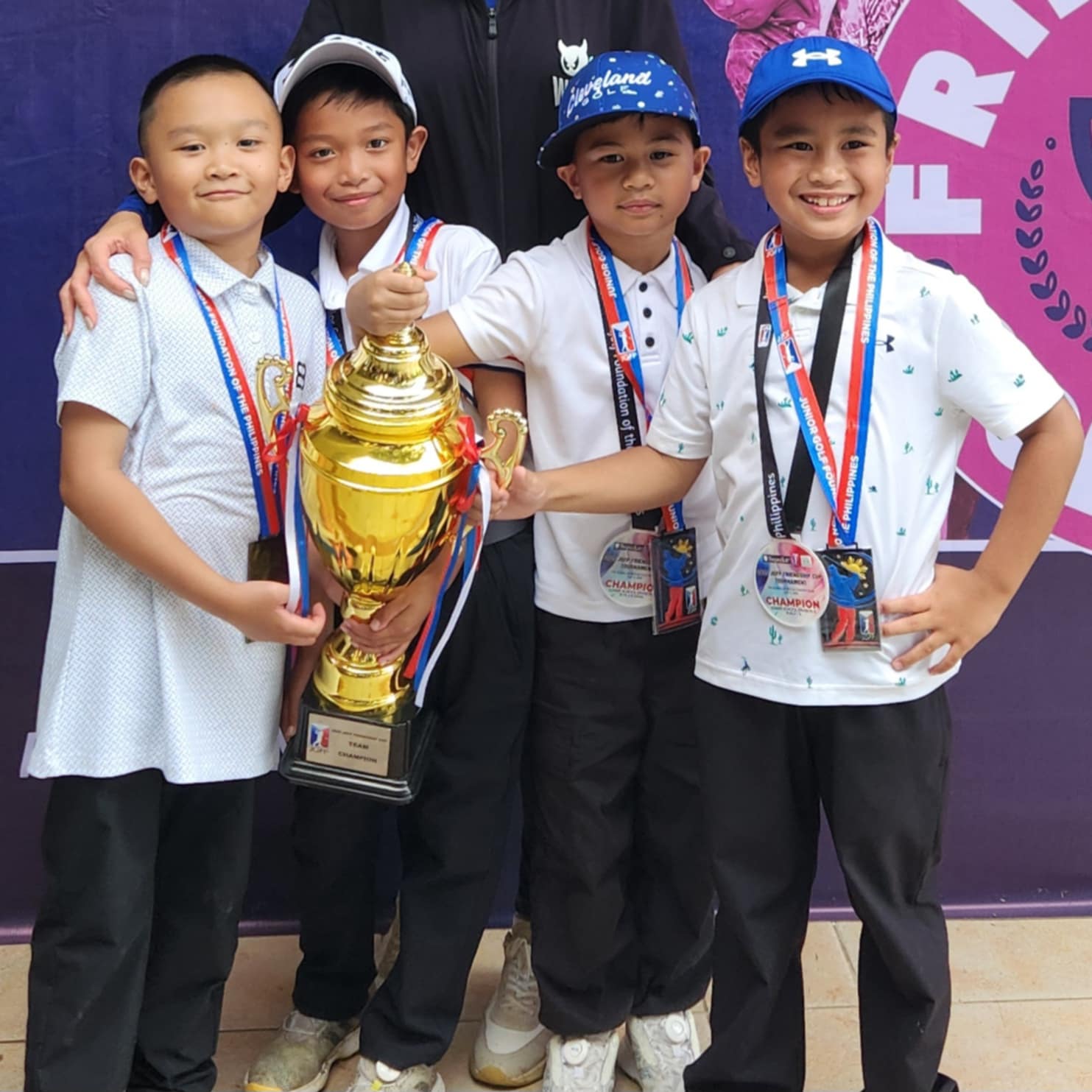 Lower School Division II Team Champions (from left) Nataniel Ilao, Cody Mercado, Datu Villamor, and Rupert Cariño of "Fore-of-a-kind"  