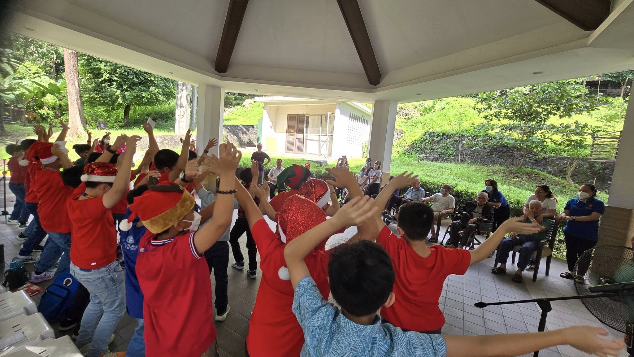 AGS boys sing for the Lolo Jesuits