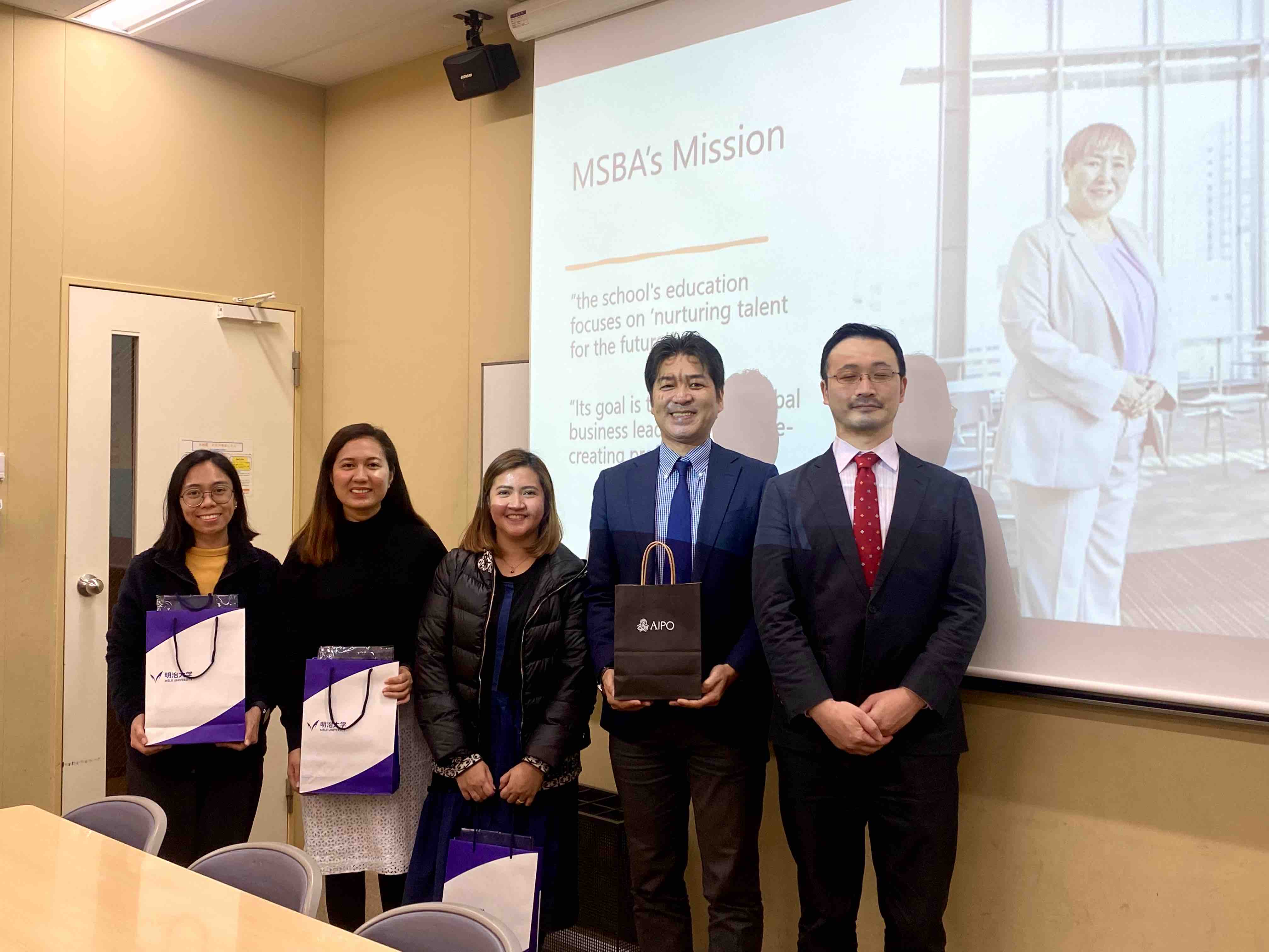 Photo with representatives from Meiji University and AIPO. From left: Ms Wilma Alamar, and Ms Vanessa Malapit, Ms May Ann Albis from the Ateneo Intellectual Property Office (AIPO); and from Meiji University, Dr Kikuchi Masao, Chair, Department of Public Management & Professor, School of Business Administration, and Dr Miyata Kenichi, Associate Professor, School of Business Administration