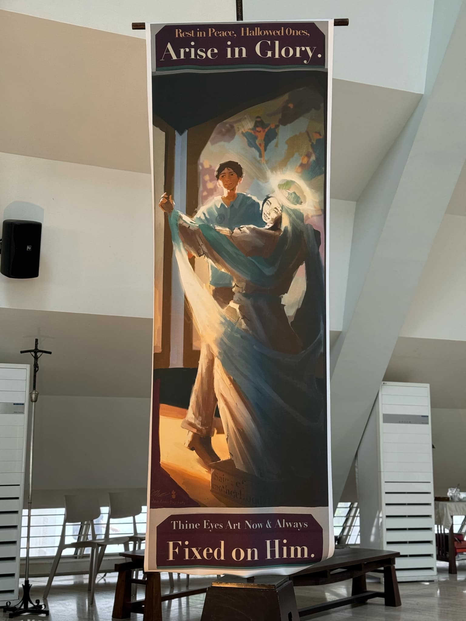 Josh Ong Ante's banner will be displayed in the Church of the Gesù through November 2024.
