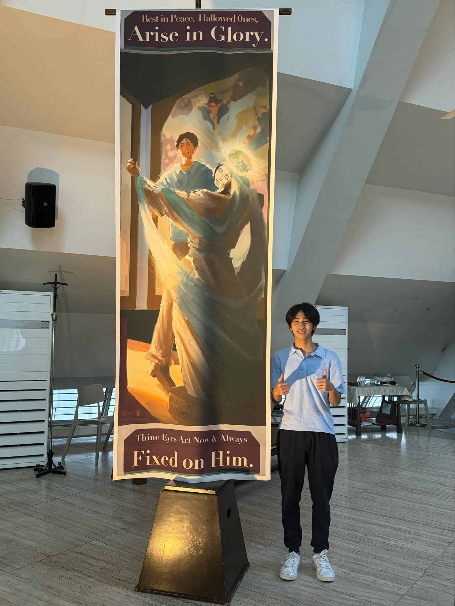 Josh Ong Ante poses with his creation 