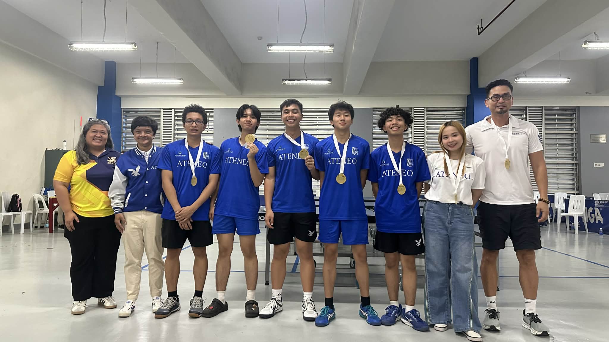 From left: Xavier Sports head, Coach Mihali Crisostomo, Aston Panlaqui, Gareth Arcedera, Timothy Pachica, Matthew Basco, Rajel Quiming, Coach Anya Fabregar, and Mr. Chito Pachica