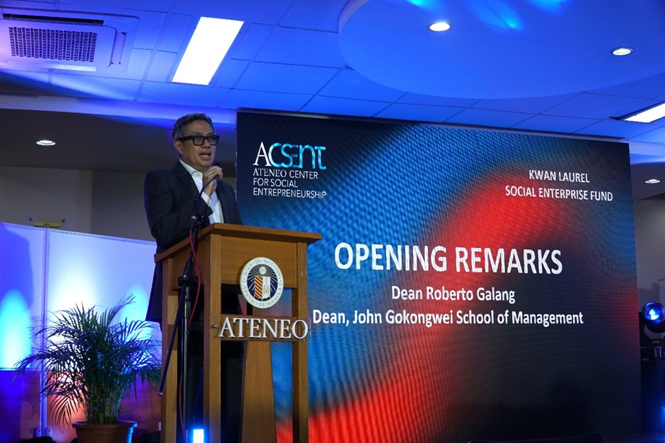 Dean Roberto Galang of JGSOM giving the opening remarks