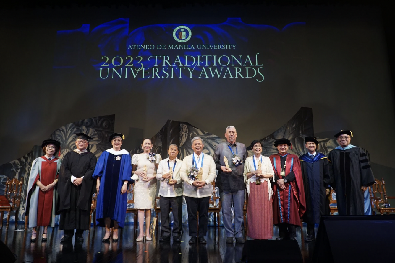 The honorees onstage with University officials