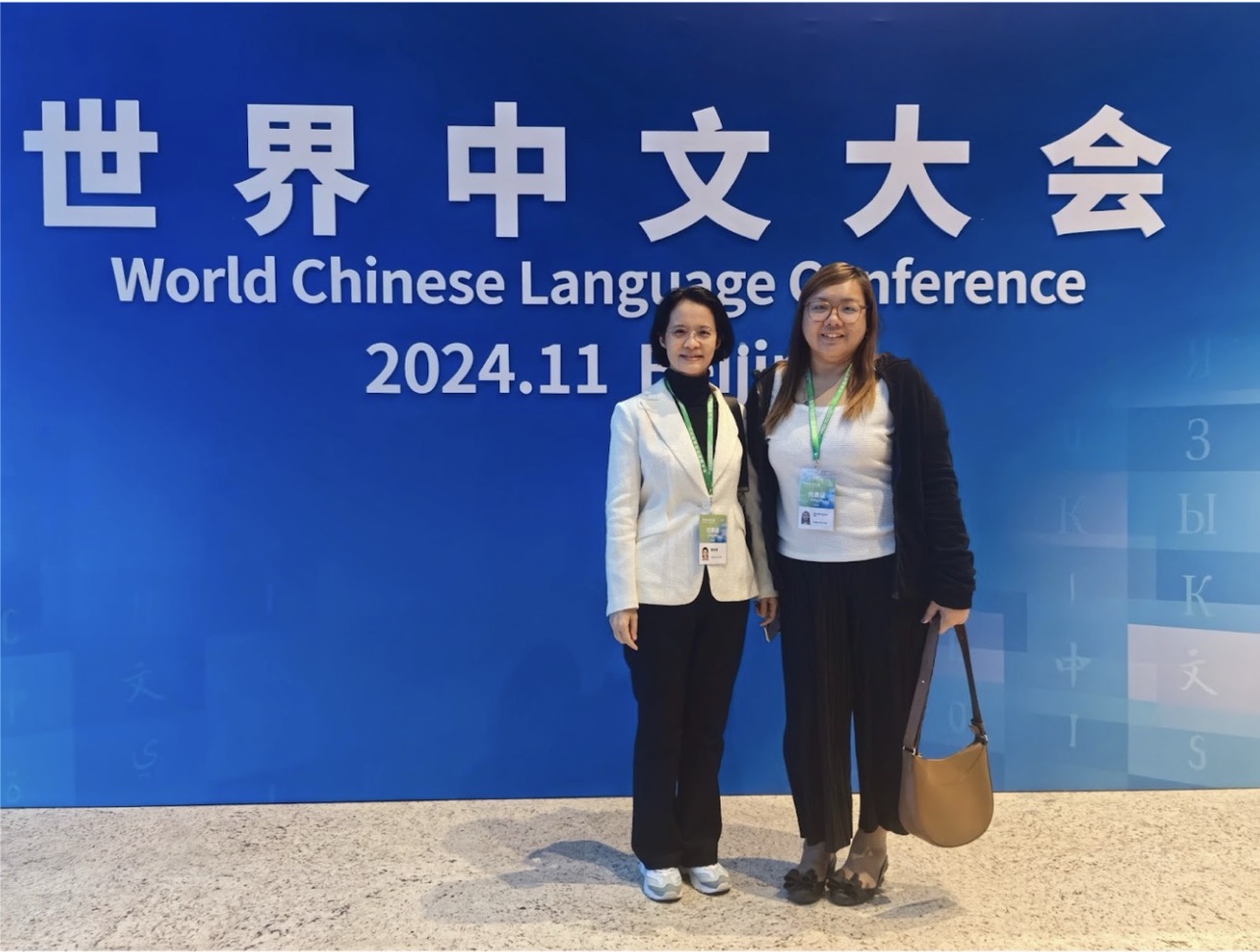 CI- Ateneo Chinese Director Dr Huang Linjun (left) and CI-Ateneo Administrative Assistant Ms Stephanie Tan