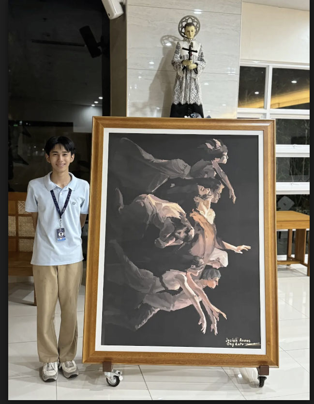 Josh Ong Ante poses with his legacy artwork in the ASHS St Gonzaga Chapel 