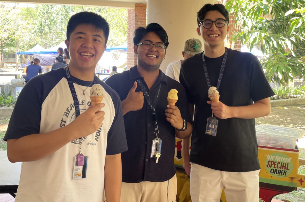 Attendees pose with their free ice cream