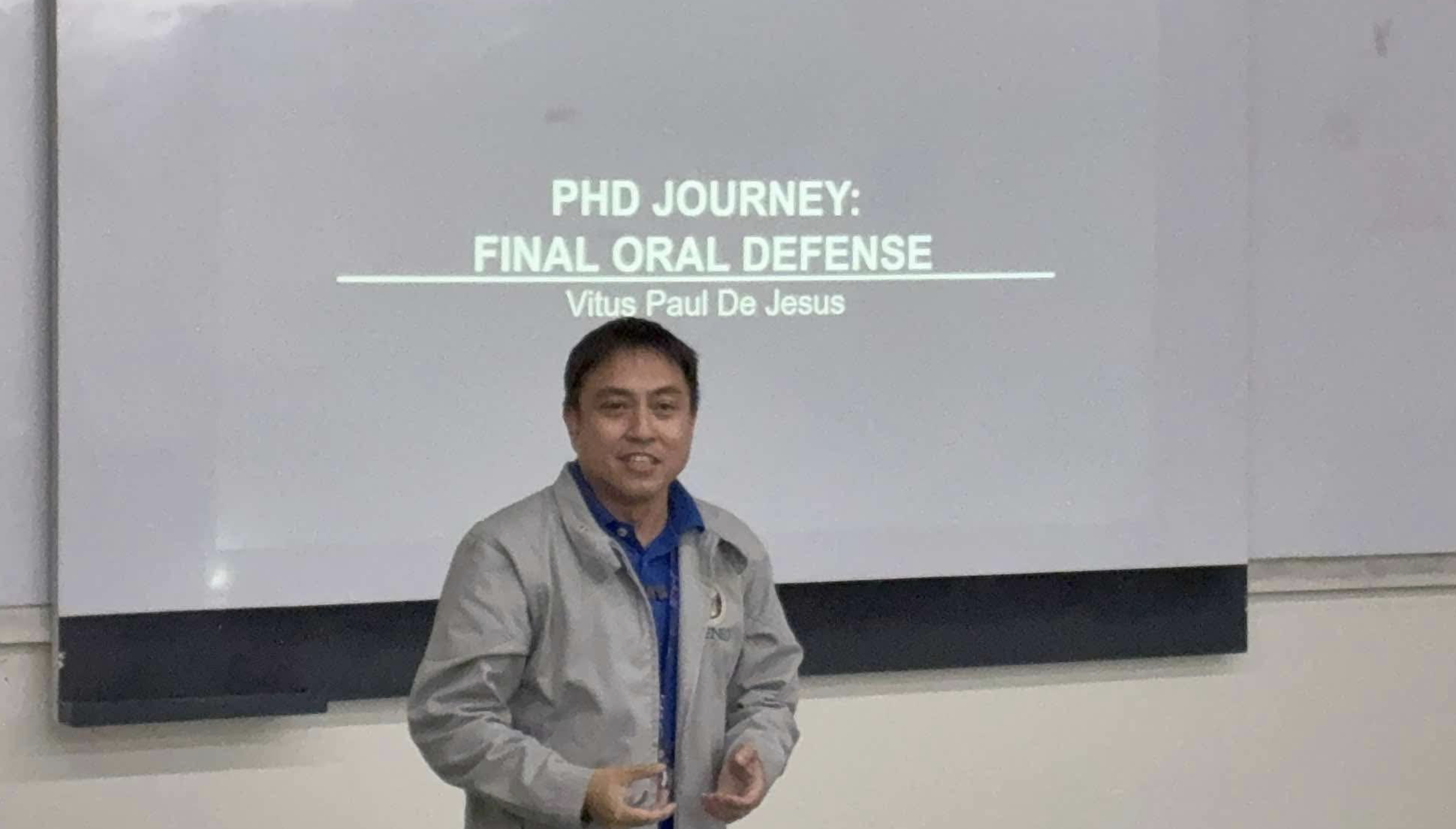 Dr de Jesus discussing his final oral defense.