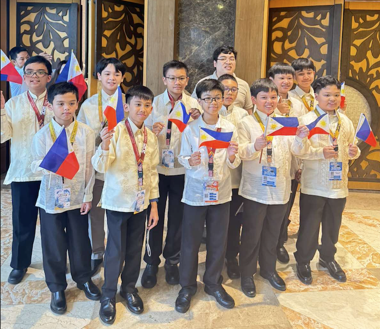 Some of the AGS mathletes who attended the PhIMO Final Round 2025 onsite in Cebu. Front row from left: Basti Castro, Stevie Pastor, EJ Simon, Nathan Posadas, Martin Abesamis; middle row from left: Kyle Sadueste, Vico Babaran, Malcolm Raymundo, Iñigo Cristobal, Russ de Belen, Mateo Palitog; back row: Mr Javier Inumerable (coach) 