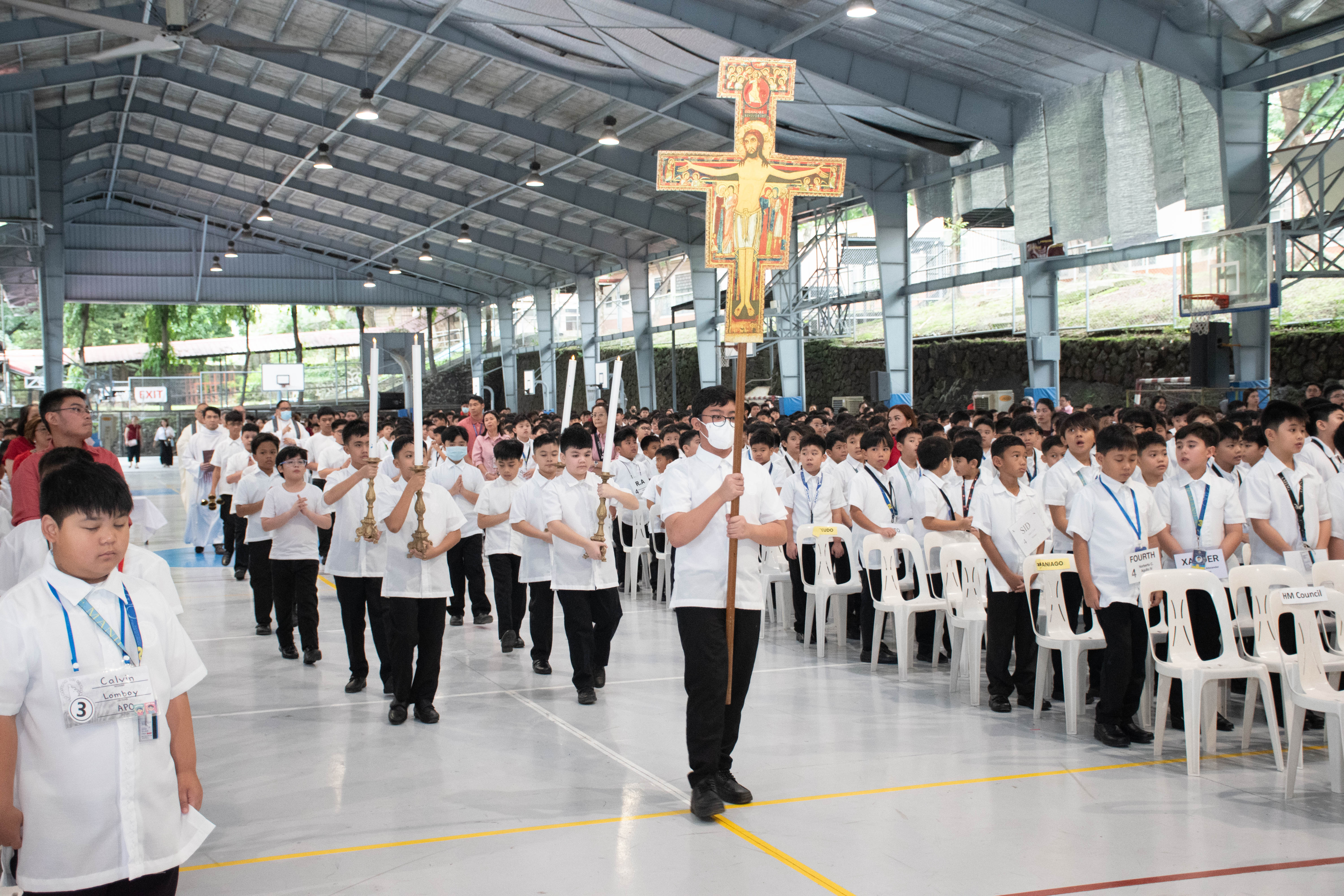 Students in solemn procession for the celebration of St. Ignatius—a journey of hope and mission.