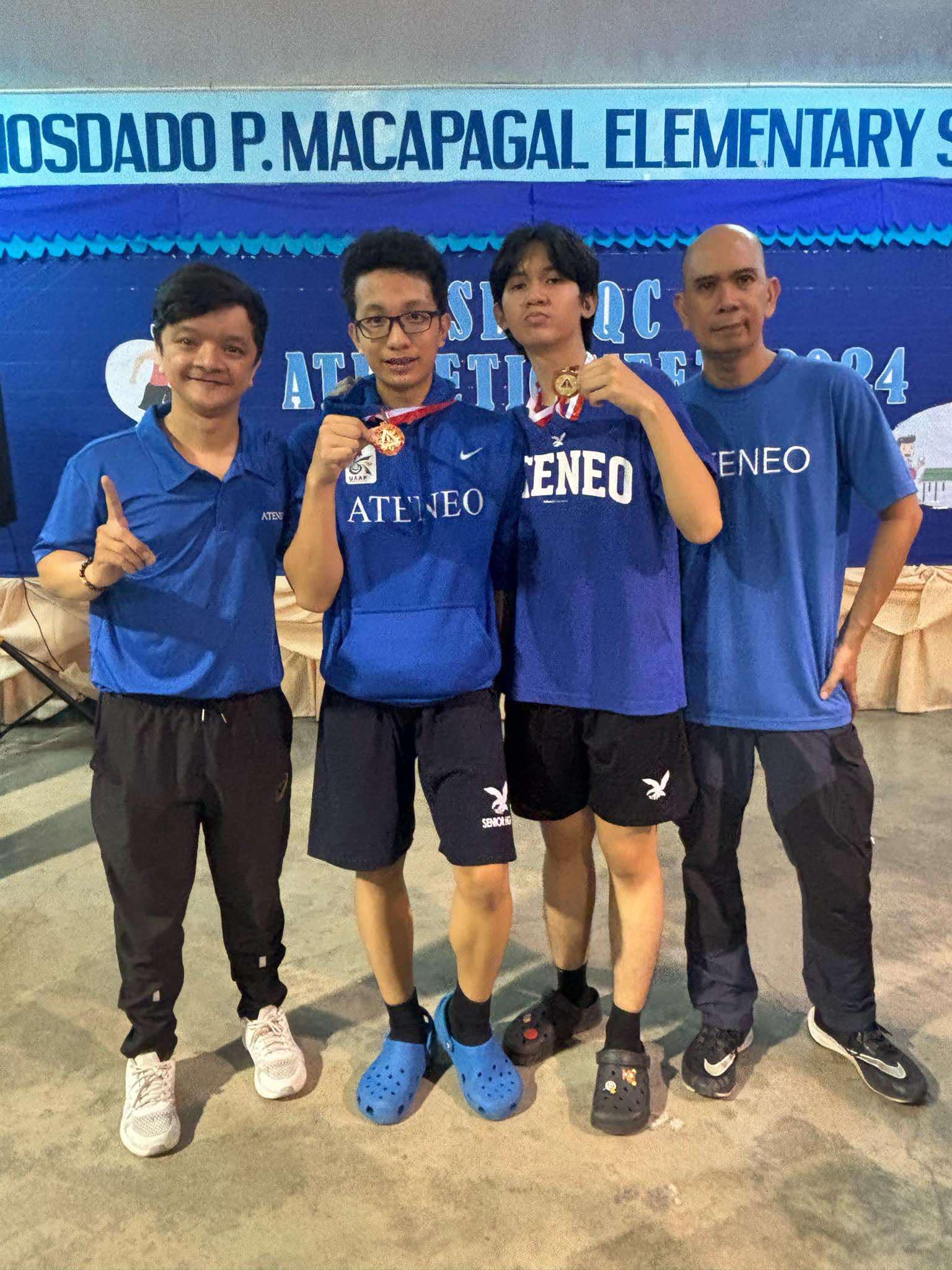 Doubles champions! From left: Coach Mihali Crisostomo, Rajel Quiming, Matt Basco, and Coach Leo Raymundo in the QC Division Meet