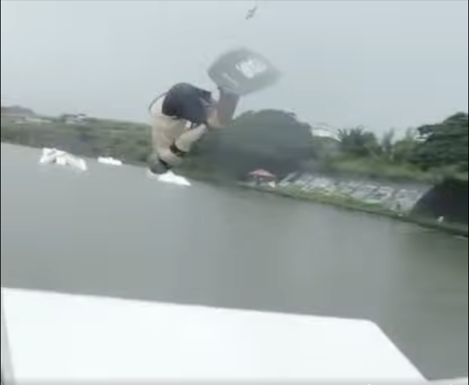 Screenshot of gold medalist Jose Ignacio doing a mid-air front flip (aka "front roll")