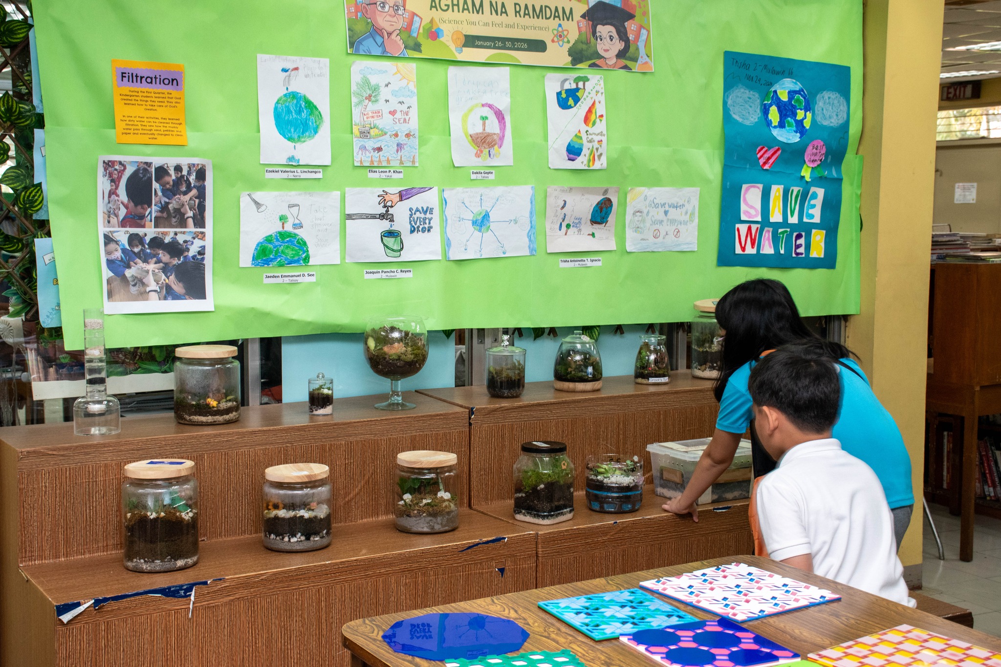 Terrariums and Science posters on display