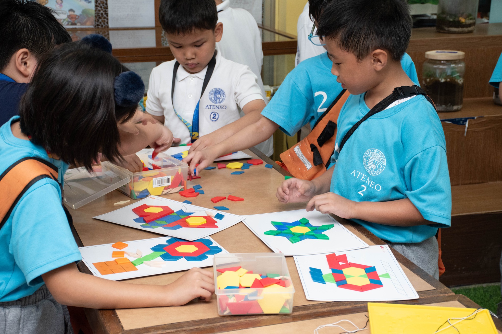 Students working on tiling patterns