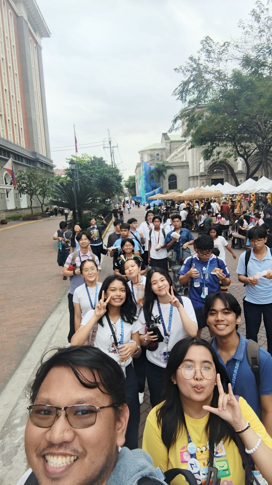 Students with Lord Mc Will R Perucho, facilitator of the Sa Loob ng Pader: An Experiential History Class in Intramuros.