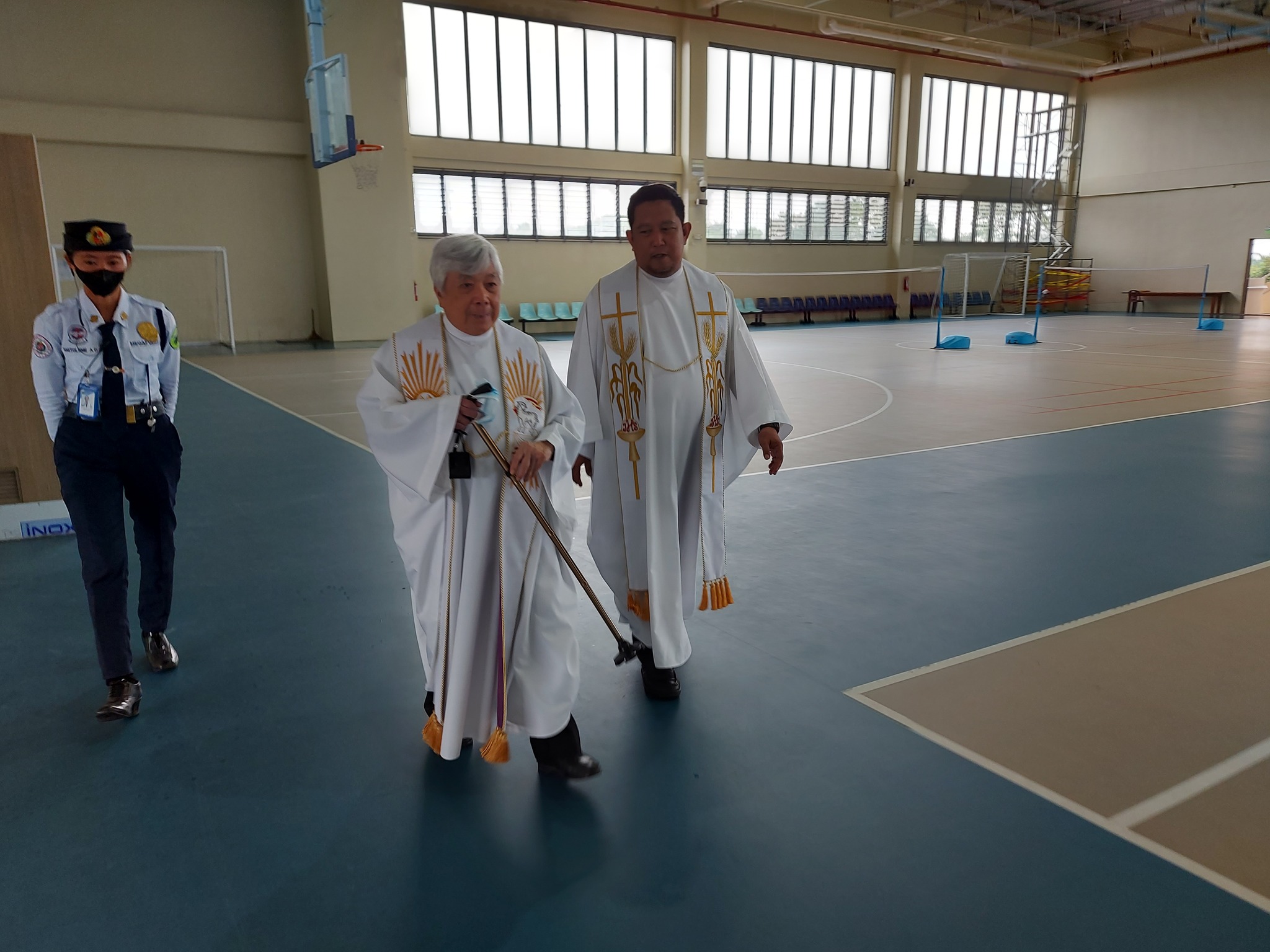 Fr Bert Ampil SJ (center) and Fr Bong Dahunan SJ (right) after blessing the 3rd floor of the FLC 