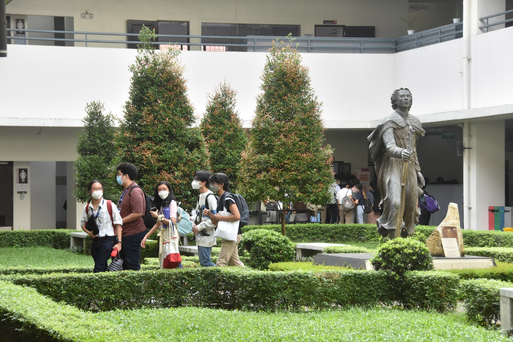 ASHS grade 12 students in the courtyard of St. Ignatius