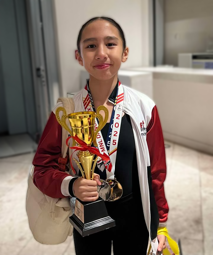 Bree Balburias with her medals from MNL Dance Prix 2025