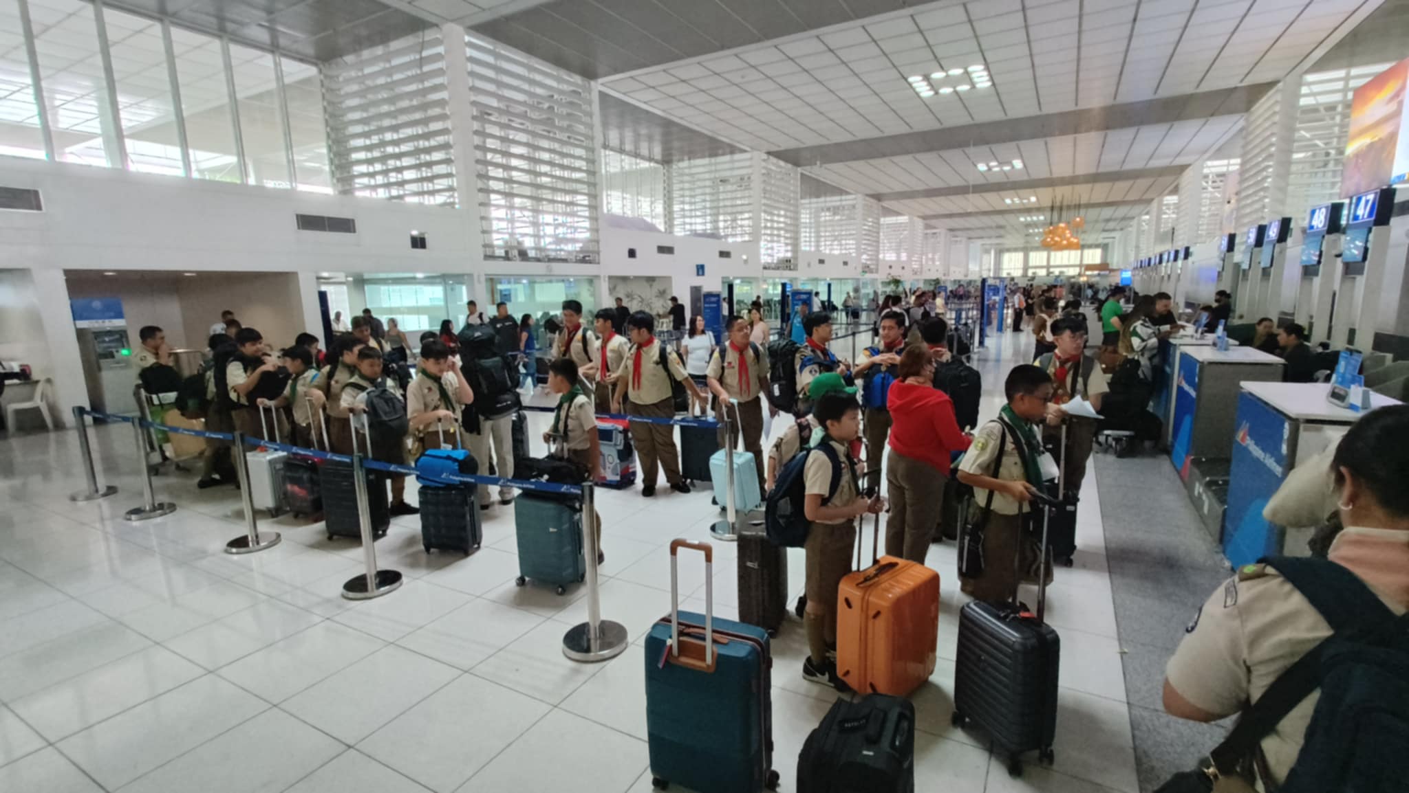 Ateneo de Manila Scouts during check-in at the airport  
