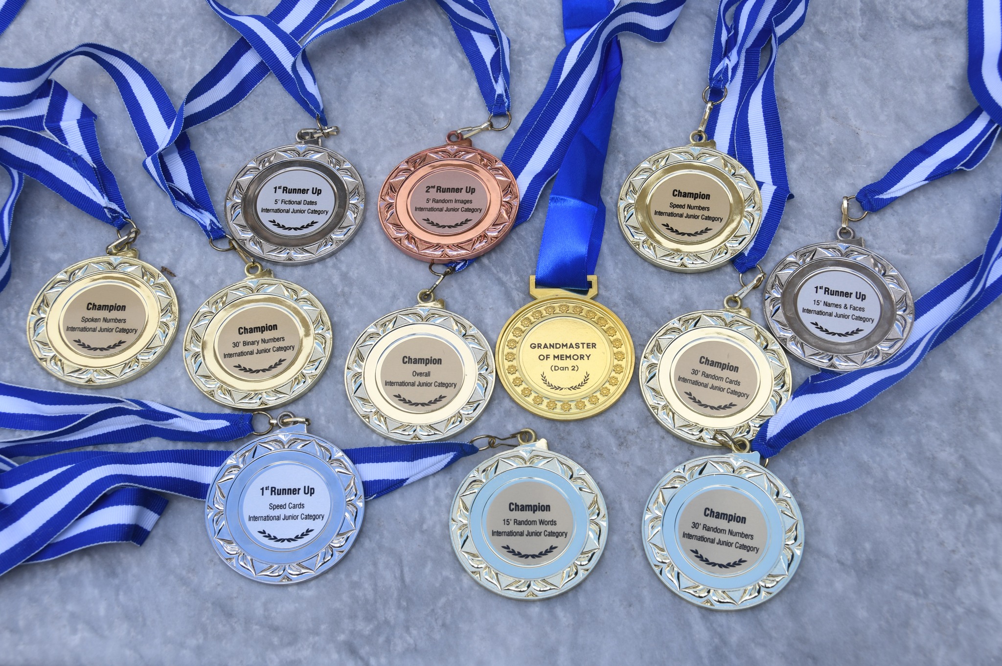 Chloe Galamgam's medals from the Asia Open Memory Championship 2024  