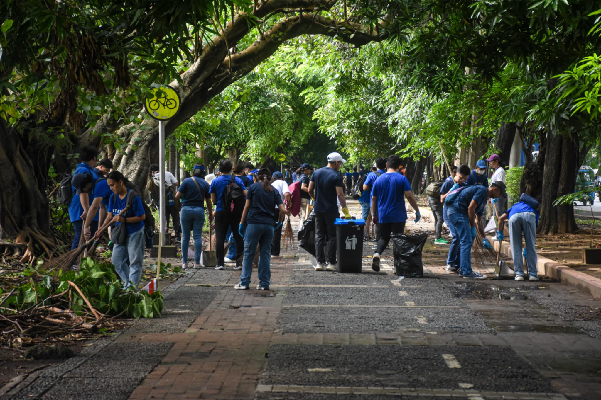 Sweeping changes: AJHS faculty and staff during the "Cleantramuros" clean-up