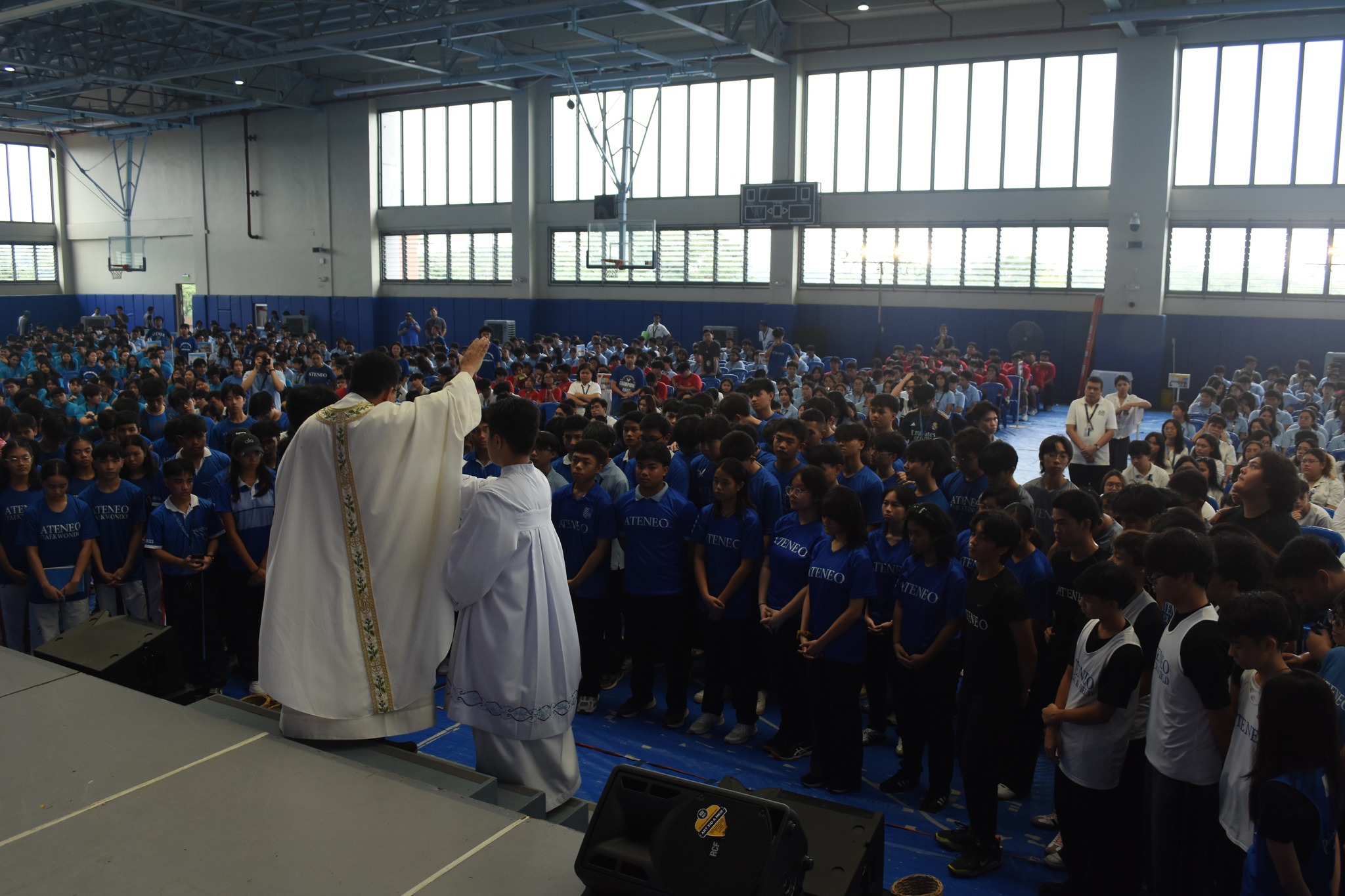 Fr Noel Bava SJ blesses the athletes 