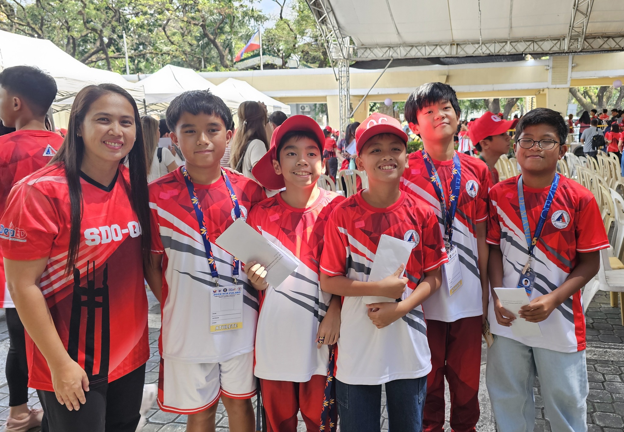 From left: Coach Krystal De la Cruz, David Dela Cruz, Joaquin Plazo, Caleb Pablo, Jacob Blanco, and Javier Jaime Pamandanan 