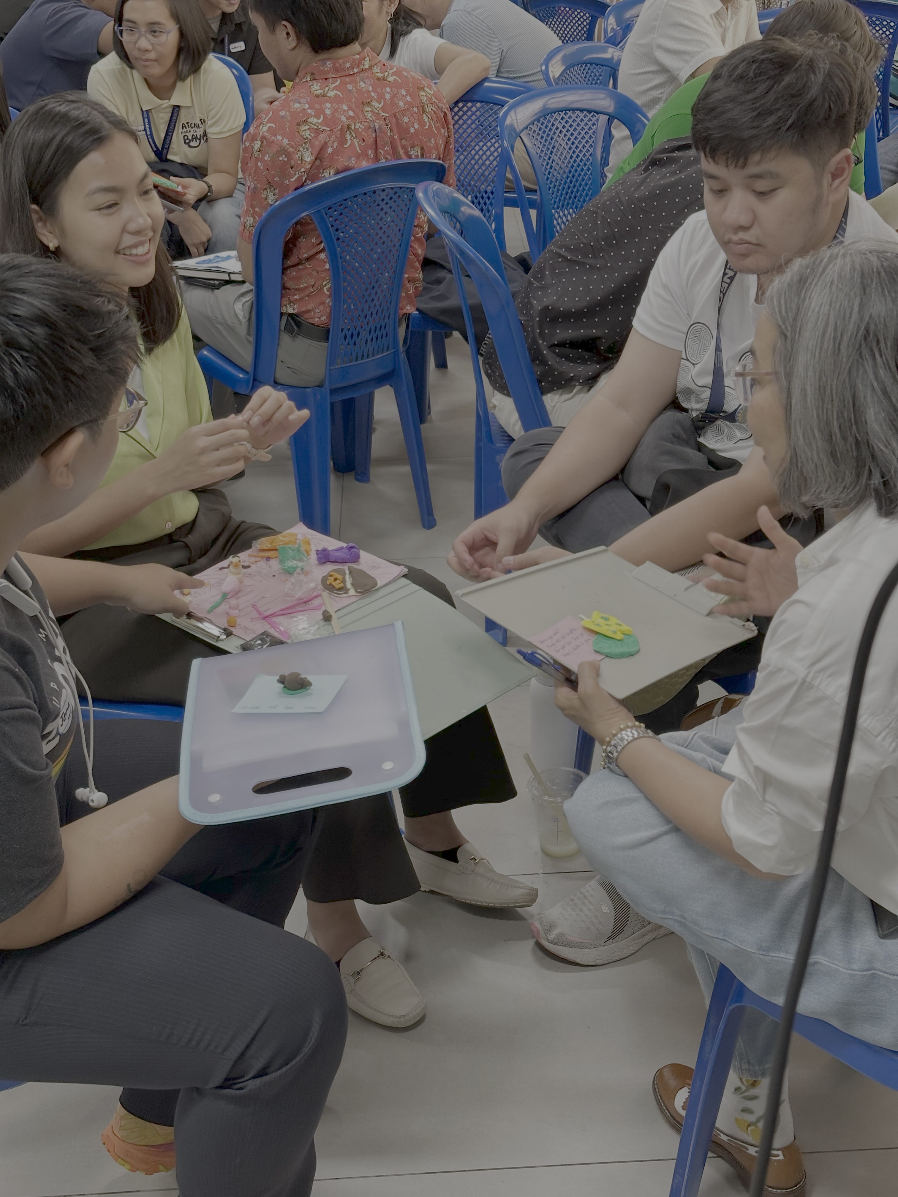 ASHS teachers and staff engage in a clay-sculpting activity
