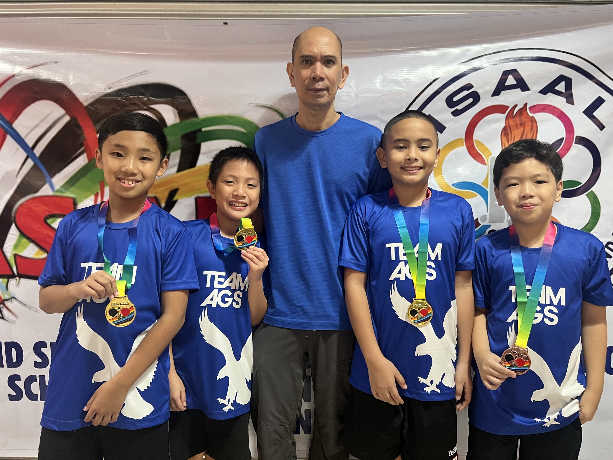 (L-R) Philo Go, Karl Guanio, Coach Leo Raymundo, Titus Pachica, Rafa Tongson