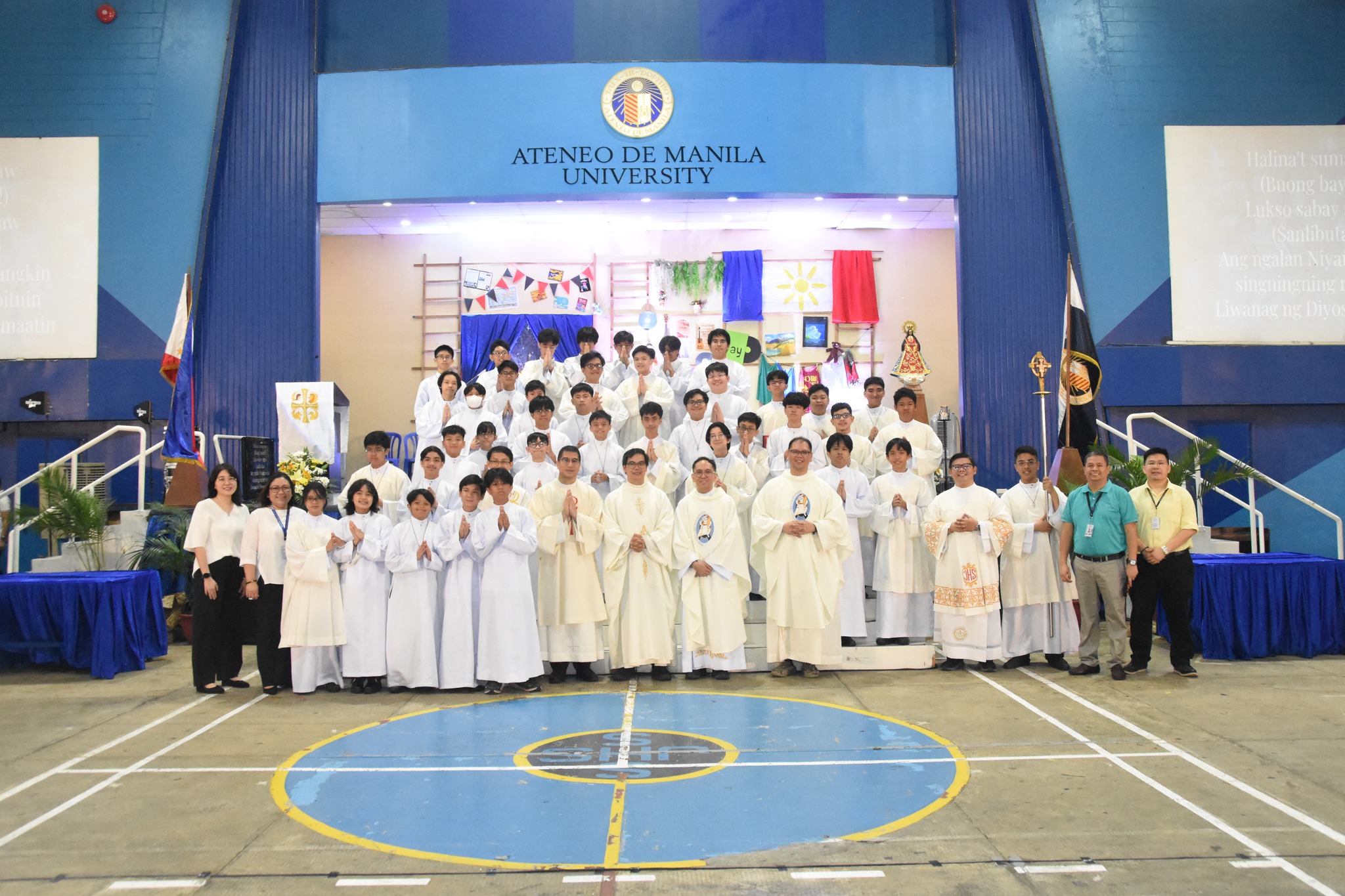 Rev Deacon Melvin G. Paulme SJ, Fr Lloyd V Sabio SJ (School Supervisor of Saint Isidore High School in Bukidnon), AJHS Chaplain Fr Mamert B Mañus SJ, and Fr Erwin F Arandia SJ (Philippine Jesuit Prison Service Foundation, Inc.) together with the Ateneo Liturgical Ministry and the AJHS A-Team at the conclusion of the Force for Good Mass 