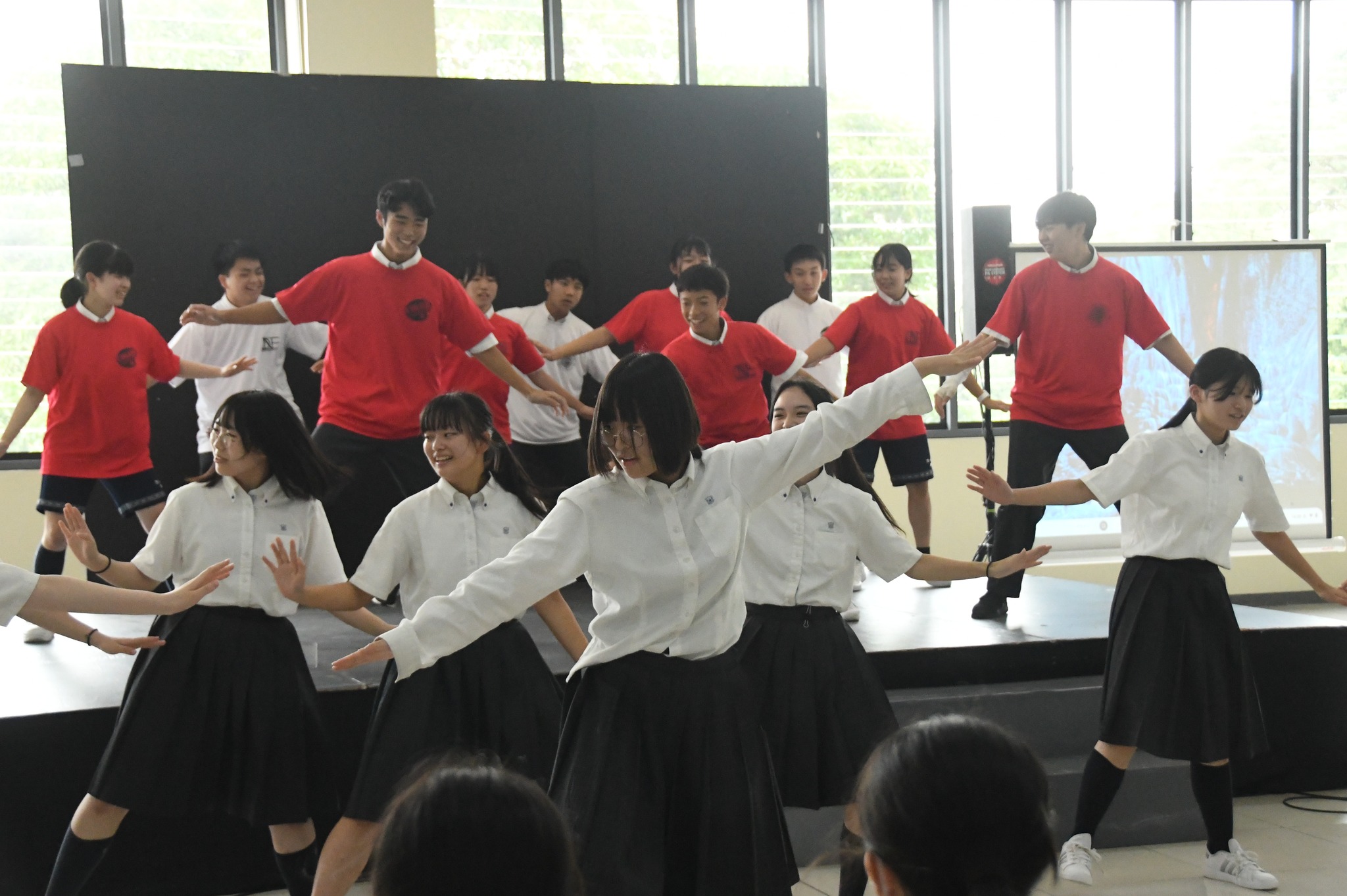 The visitors dance for their hosts  