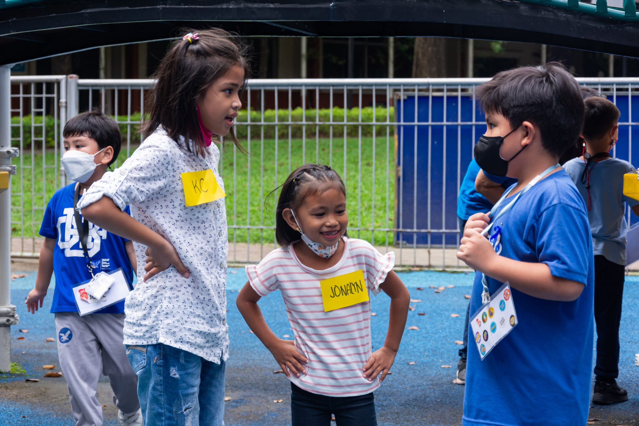 AGS Grade 1 student with new friends from Tangos Mission Station