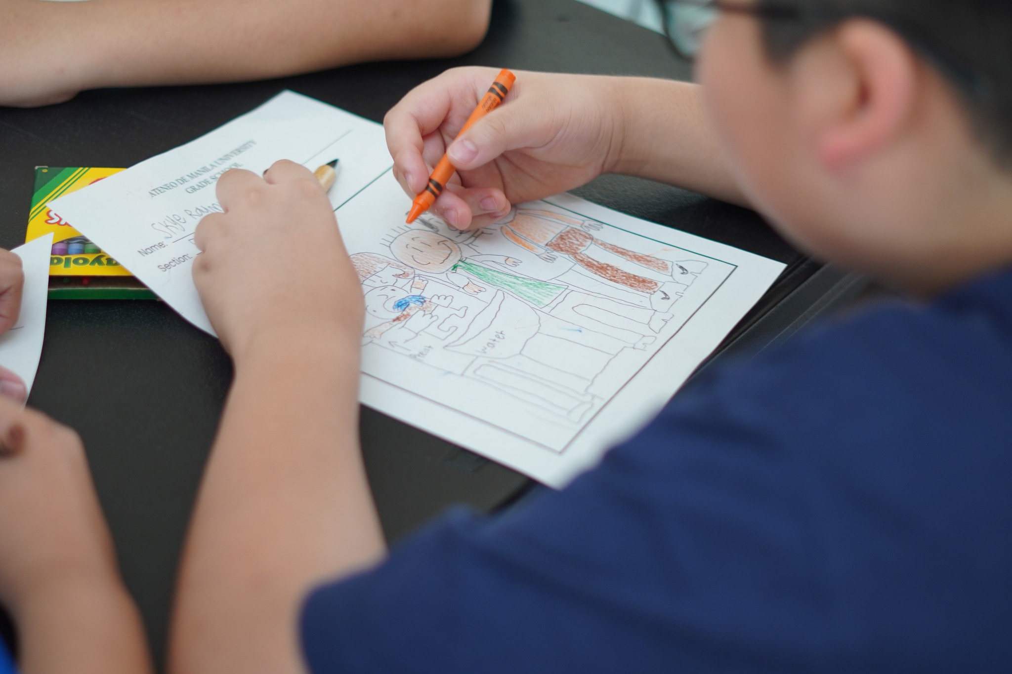 Drawing their baptism reminded the Grade 5 boys of God’s love and their parents’ love.